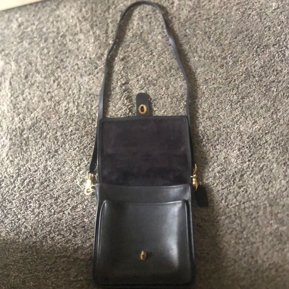 Women’s Black and gold classic Coach purse